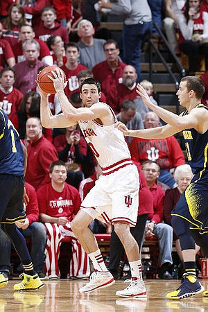Glenn Robinson III (1) and Nik Stauskas (11)