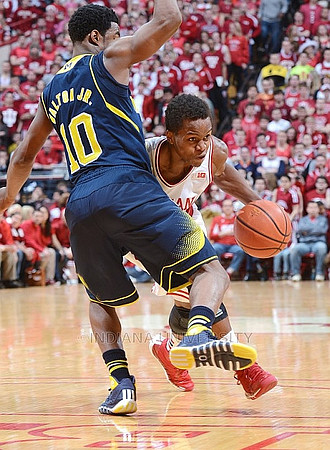 Jordan Morgan (52) and Caris LeVert (23)