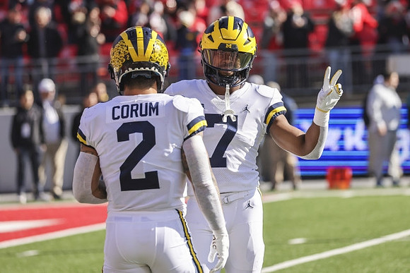 Blake Corum (2) and Donovan Edwards (7)