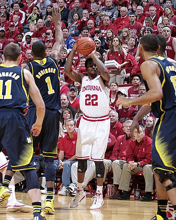 Jon Horford (15) and Indiana Head Coach Tom Crean
