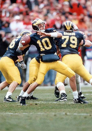Tom Brady (10), Aaron Shea (36), and Jeff Backus (79)