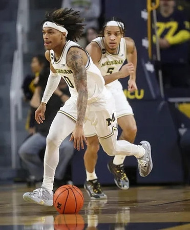 Dug McDaniel (0) and Terrance Williams II (5)