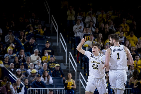 Will Tschetter (42) and Hunter Dickinson (1)