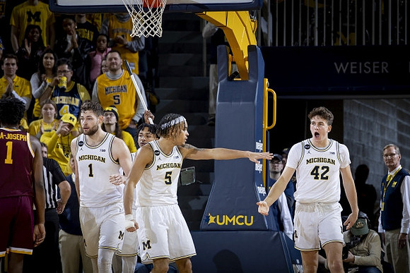 Hunter Dickinson (1), Kobe Bufkin (2), Terrance Williams II (5), and Will Tschetter (42)
