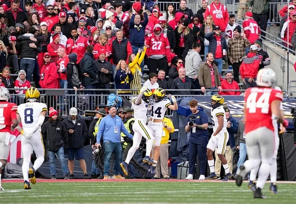 Ronnie Bell (8), Donovan Edwards (7), and Roman Wilson (14)