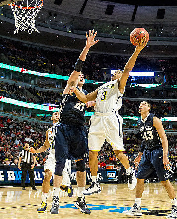 Jordan Morgan (52), Nik Stauskas (11), Glenn Robinson III (1), and Trey Burke (3)