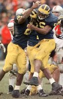 Ian Gold (20) and Dhani Jones (55)