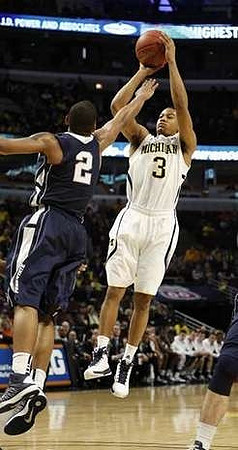 Glenn Robinson III (1), Mitch McGary (4), and Jordan Morgan (52)