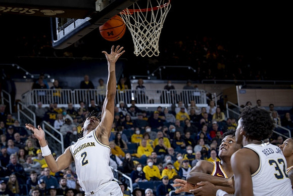 Kobe Bufkin (2) and Tarris Reed Jr. (32)