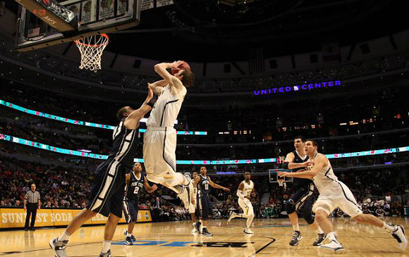 Nik Stauskas (11), Mitch McGary (4), and Tim Hardaway Jr. (10)