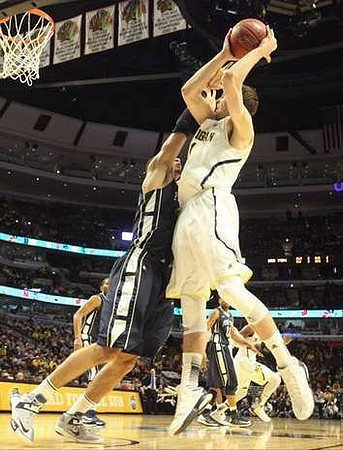 Tim Hardaway Jr. (10), Jon Horford (15), and Trey Burke (3)