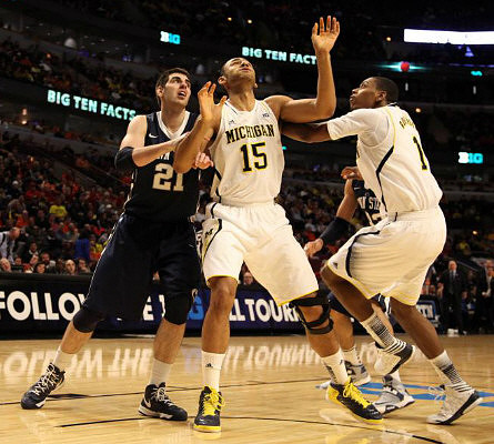 Jon Horford (15) and Glenn Robinson III (1)