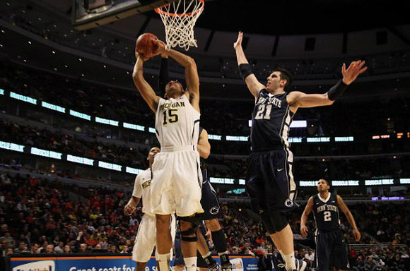 Jon Horford (15) and Glenn Robinson III (1)