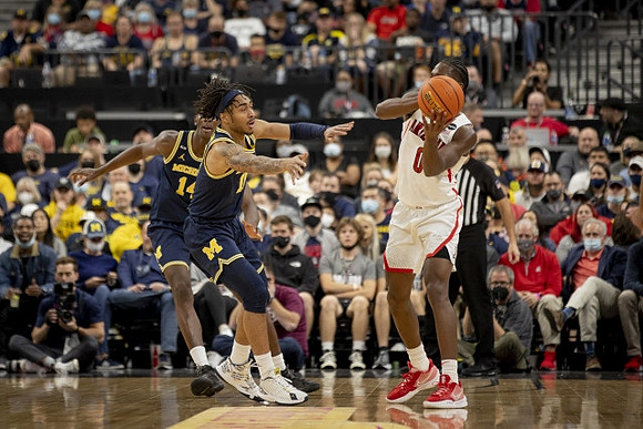 Moussa Diabate (14) and Frankie Collins (10)