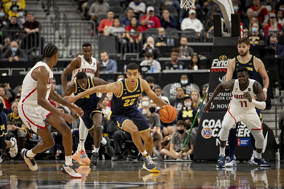 Moussa Diabate (14) and Caleb Houstan (22)