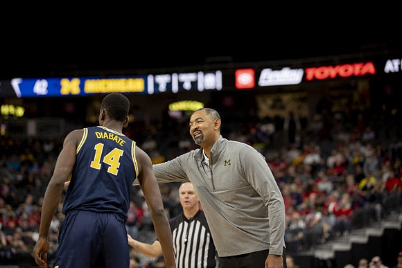 Moussa Diabate (14) and Juwan Howard