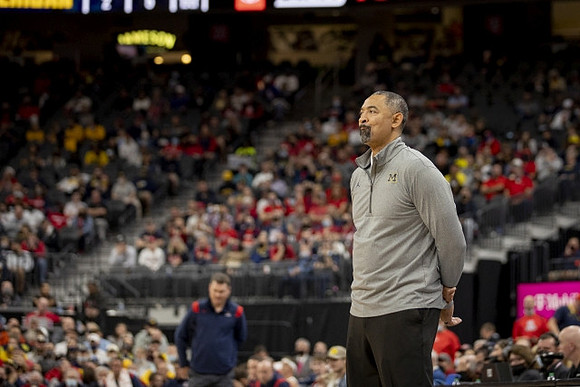 Juwan Howard and Arizona Head Coach Tommy Lloyd