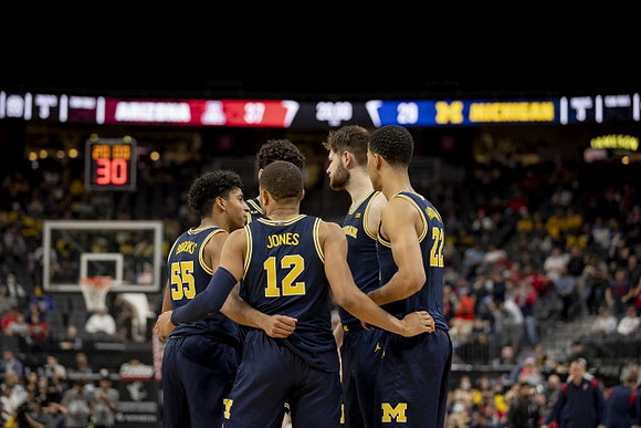 Eli Brooks (55), Brandon Johns Jr. (23), DeVante' Jones (12), Hunter Dickinson (1), and Caleb Houstan (22)