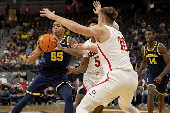 Eli Brooks (55) and Moussa Diabate (14)