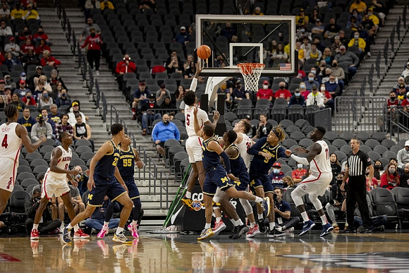 Caleb Houstan (22), Eli Brooks (55), DeVante' Jones (12), Moussa Diabate (14), and Terrance Williams II (5)