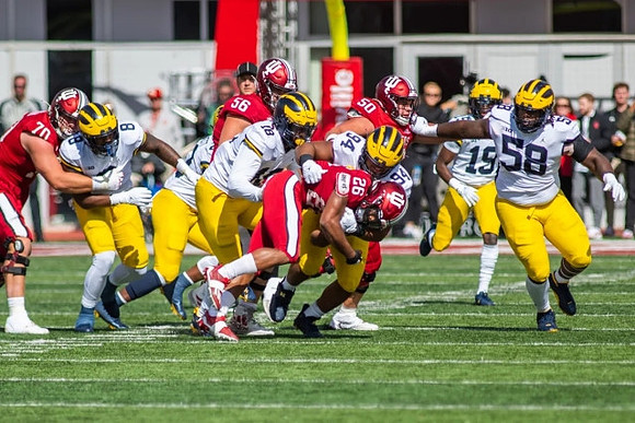 Derrick Moore (8), Eyabi Anoma Okie (18), Kris Jenkins (94), Rod Moore (19), and Mazi Smith (58)