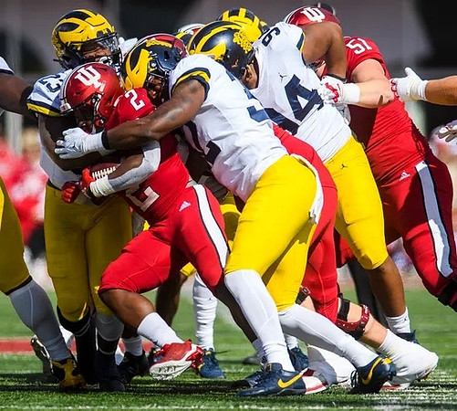Michael Barrett (23), Jaylen Harrell (32), and Kris Jenkins (94)