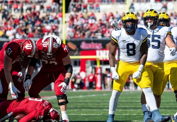 Derrick Moore (8) and Mason Graham (55)