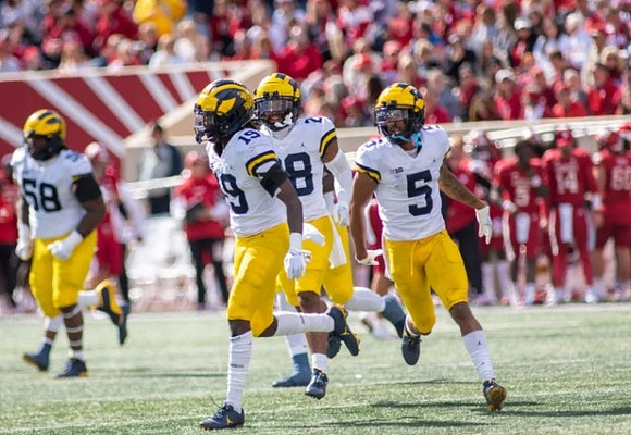 Mazi Smith (58), Rod Moore (19), Quinten Johnson (28), and DJ Turner (5)