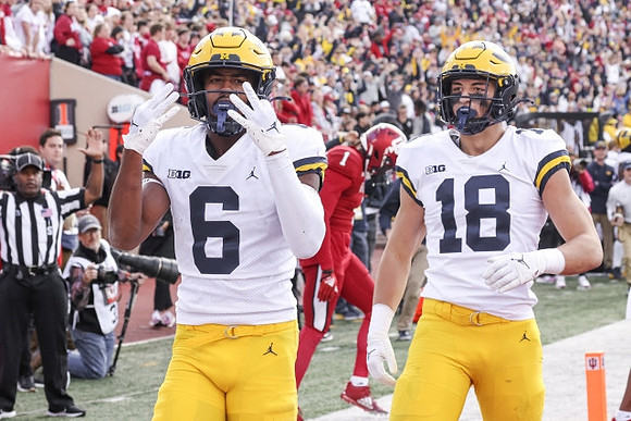 Cornelius Johnson (6) and Colston Loveland (18)