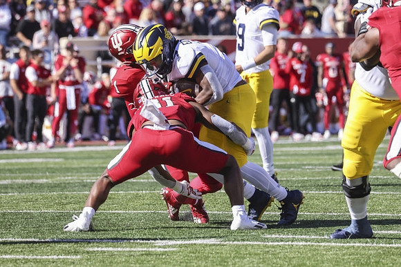 Donovan Edwards (7) and J.J. McCarthy (9)