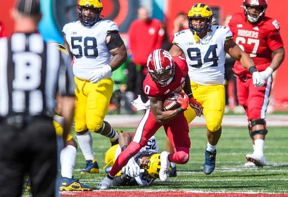 Mazi Smith (58), Junior Colson (25), and Kris Jenkins (94)