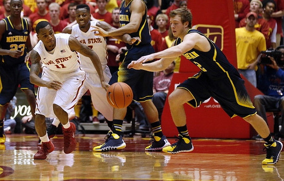 Spike Albrecht (2) and Caris LeVert (23)