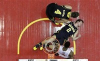 Mitch McGary (4) and Spike Albrecht (2)