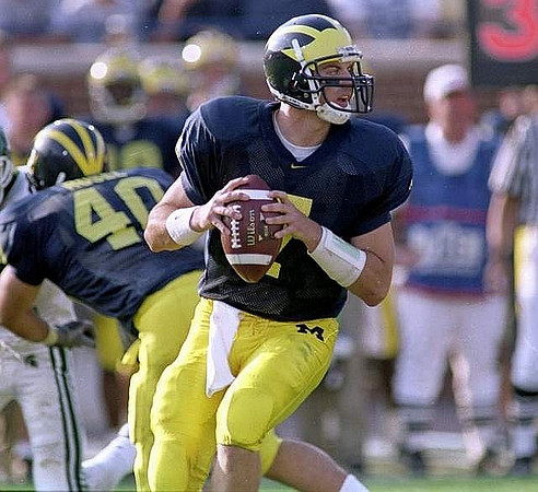 Drew Henson (7) and Eric Rosel (40)