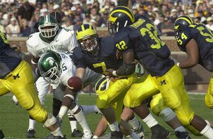 Drew Henson (7), Anthony Thomas (32), and Maurice Williams (54)