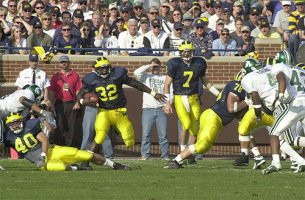 Anthony Thomas (32), Eric Rosel (40), Drew Henson (7), and Jonathan Goodwin (78)