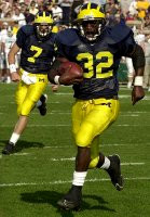 Anthony Thomas (32) and Drew Henson (7)