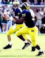 Drew Henson (7) and B.J. Askew (35)