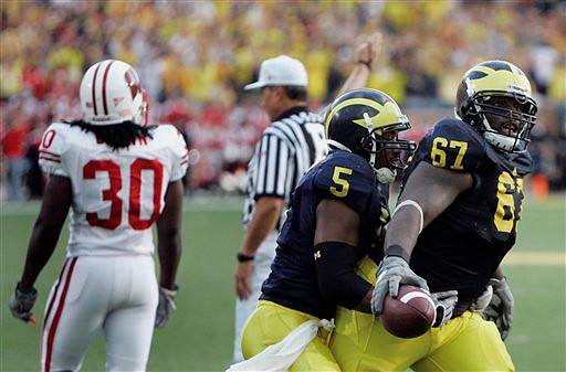 Charles Stewart (5) and Terrance Taylor (67)