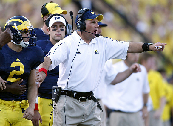 Sam McGuffie (2), Nick Sheridan (8), and Rich Rodriguez