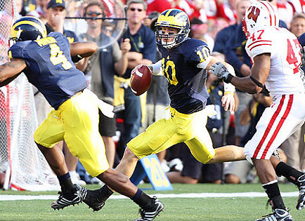 Brandon Minor (4) and Steven Threet (10)