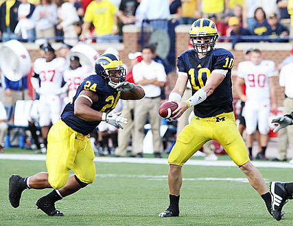 Kevin Grady (24) and Steven Threet (10)