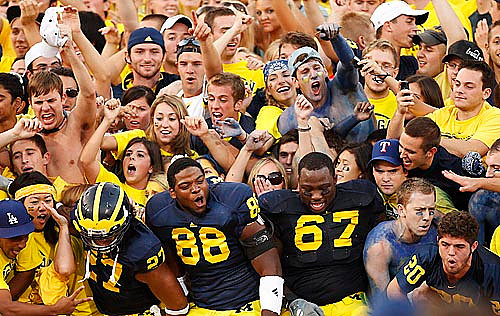 Brandon Harrison (27), Andre Criswell (88), and Terrance Taylor (67)