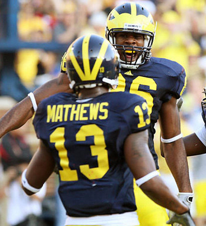 Kevin Koger (86) and Greg Mathews (13)