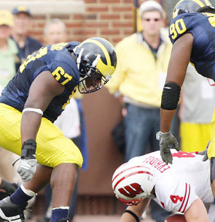 Terrance Taylor (67) and Tim Jamison (90)