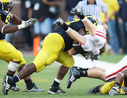 Brandon Graham (55) and Will Johnson (97)