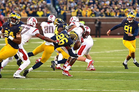Jeremy Clark (34), Jourdan Lewis (26), and Kenny Allen (91)