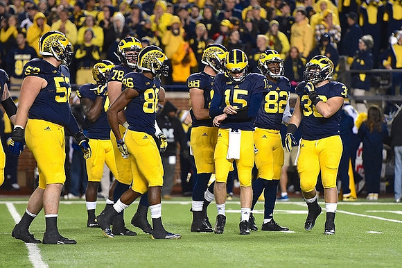 Mason Cole (52), Erik Magnuson (78), Jehu Chesson (86), Jake Butt (88), Jake Rudock (15), Amara Darboh (82), and Joe Kerridge (36)