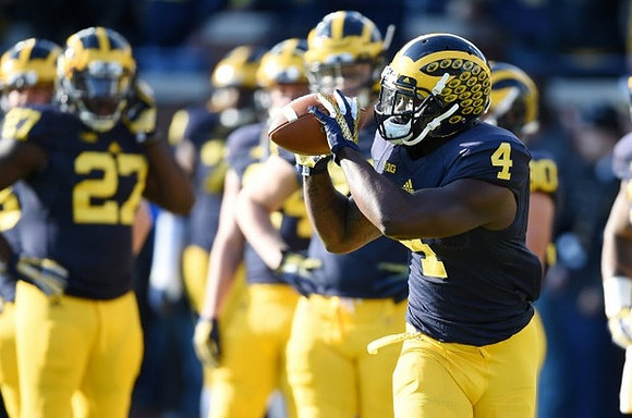 Derrick Green (27) and De'Veon Smith (4)