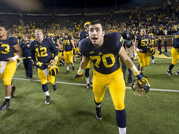 Alex Malzone (12) and Nolan Ulizio (70)